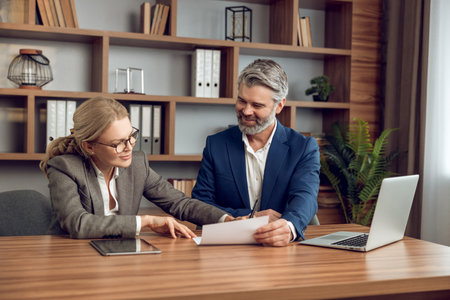 Male and female colleagues consulting in office psychotherapy sessions