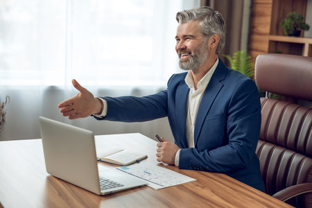 Therapist meeting his client for psychological support and mental health consultationの写真素材