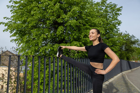 Fitness woman runner doing warm-up routine before running stretching leg muscles