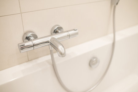 Close up picture of new bathroom fitment in a clean bathroom