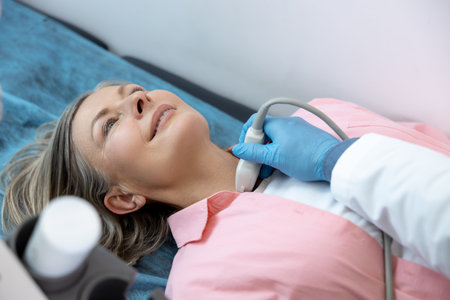 Close up of a woman lying on a couch in clinicの写真素材