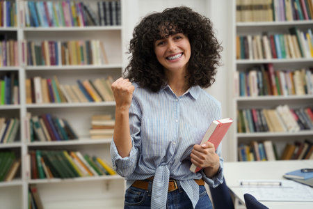 Cute young woman looking happy and excitedの写真素材