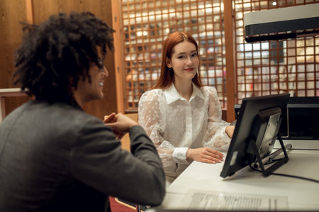 Students working together on the project and looking involvedの写真素材