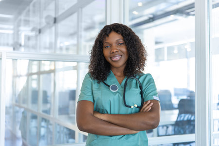 Confident good-looking african american young doctor in a lab coatの写真素材