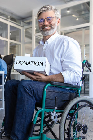 Disabled handicapped businessman asking donation for peoples with disabilities