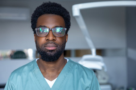 Stomatologist in medical office offering necessary treatment for maintaining oral healthの写真素材