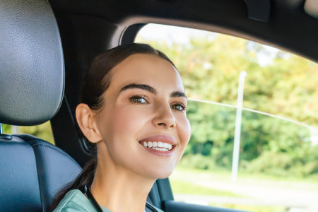 Close up of a smiling young woman looking happy