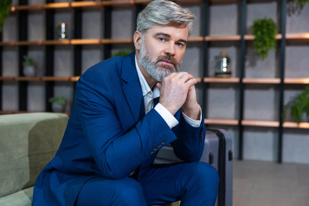 Bearded caucasian well-dressed business man looking confident and determinedの写真素材