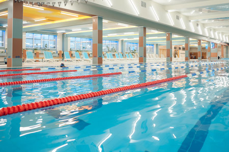 Picture of a modern empty swimming pool with blue waterの写真素材
