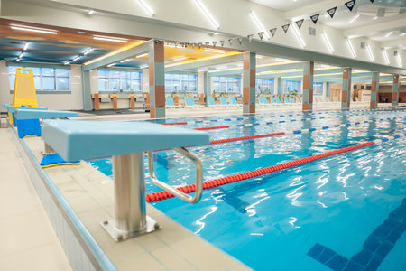 Picture of a modern empty swimming pool with blue water