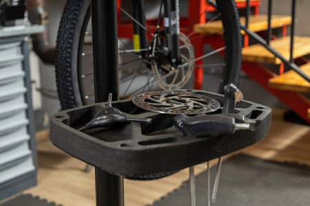 Side angle of bicycle wheel on repair stand