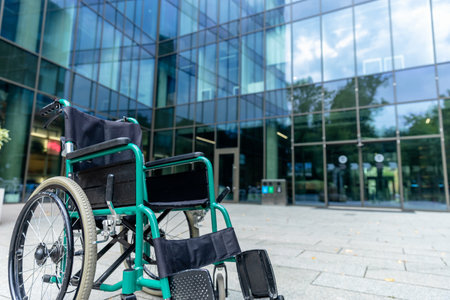 Wheelchair in the middle of the yard of rehabilitation centerの写真素材