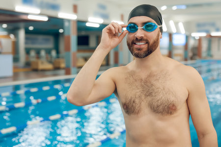 Man having a workout in the swimming poolの写真素材