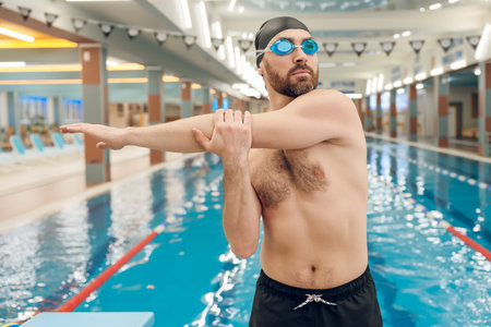 Man having a workout in the swimming poolの写真素材