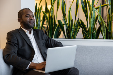 African american businessman working in the office and looking busy