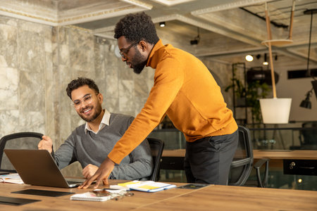 Colleagues working in the office and looking busyの写真素材