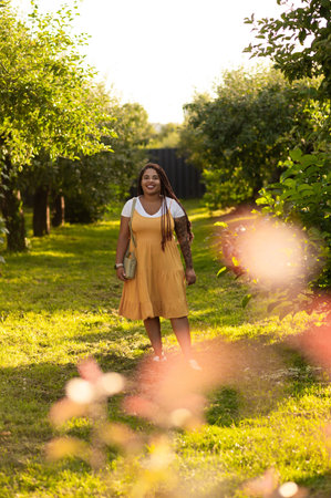 Smiling female with braided red hair and tattooの写真素材