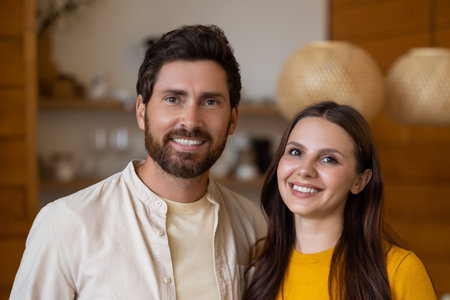 Smiling man and woman feeling excited and joyful togetherの写真素材