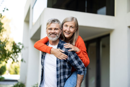 Mature couple enjoying time together and looking happyの写真素材