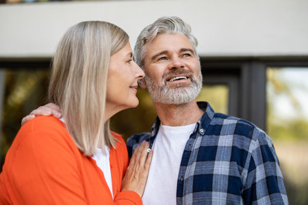 Mature couple feeling happy and smiling nicely