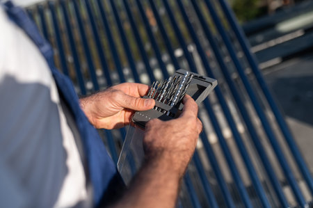 Technician inspecting renewable energy installation on rooftopの写真素材