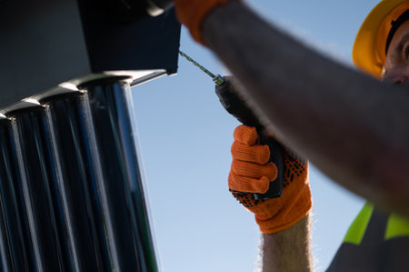 Man engineer performing maintenance work on renewable energy installation