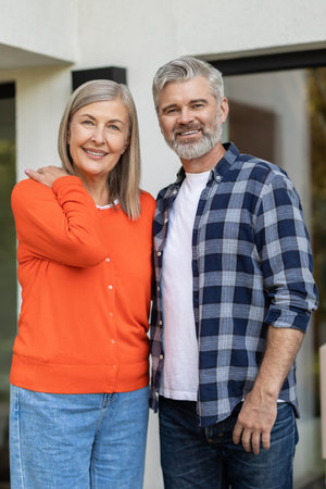 Happy mature couple feeling positive and relaxed togetherの写真素材
