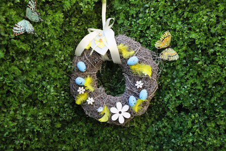 Easter wreath decoration on green grass