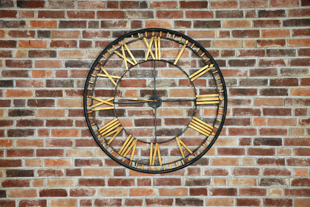 Background of brick wall with clock