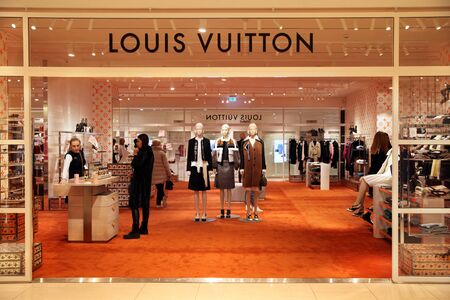 Beautiful shop Louis Vuitton, showcase with clothes . Moscow. 01.11.2018