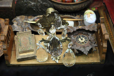 Vintage background with candelabra, clock and other objectsの写真素材