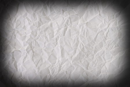 White crumpled paper on white background isolatedの写真素材