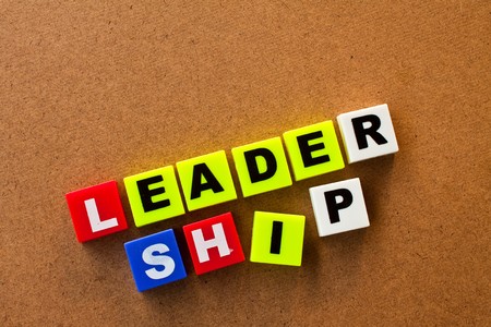 Word leadership isolated on wood board - business conceptの写真素材