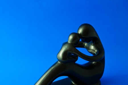 sculpture of bond between mother and baby
