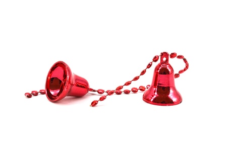 Red christmas bells isolated on white backgroundの写真素材