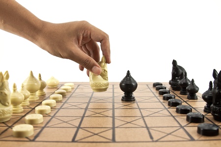 Playing chess game. defeating the opposite team.の写真素材