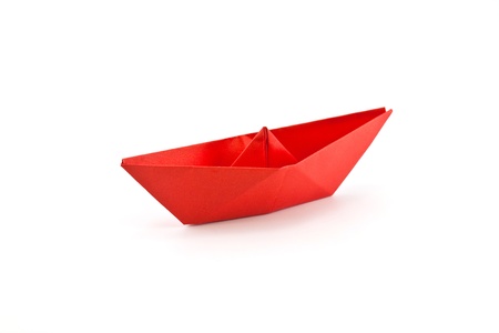 red paper boat isolated on white backgroundの写真素材