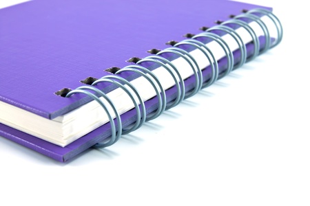 purple notebook isolated on white background, office equipmentの写真素材