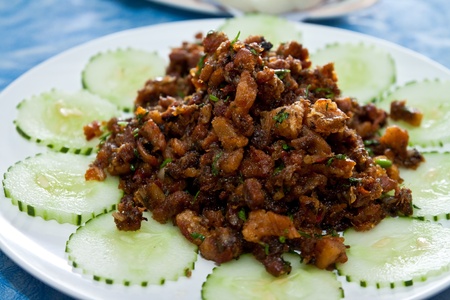 spicy thai food stir pork with black pepper