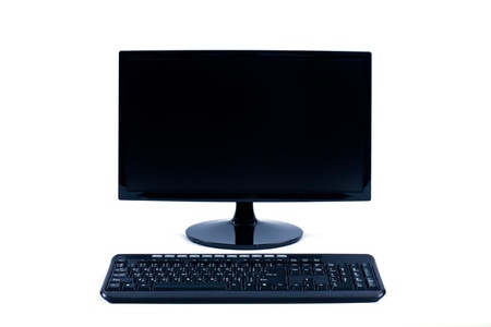 black LCD monitor and keyboard isolated on white background