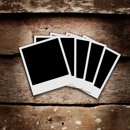 stack of polaroid photo on wood backgroundの写真素材