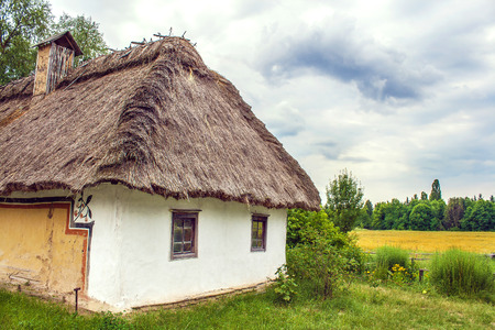 Image Ukrainian hut thatched sloping field nearのeditorial素材