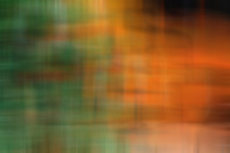a Orange abstract image of green blurred backgroundの写真素材
