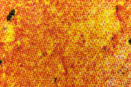 image of homespun fabric in yellow and red colors