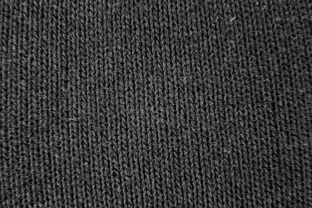 Image of black and white fabric background of woolen look