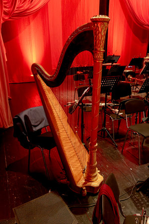 Image of a musical instrument harp on the theater stage during intermissionの写真素材