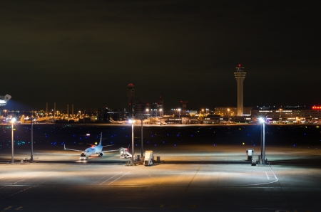airplane parking in airport, at nightのeditorial素材