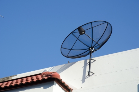 Home Satellite Dish with blue skyの写真素材