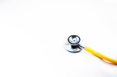 Yellow Stethoscope in isolated whiteの写真素材