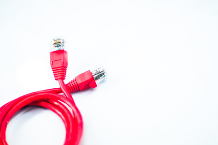 Red Network Cable with Isolated white backgroundの写真素材